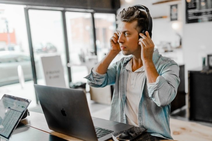 A male professional analyzing a digital relationship mapping interface with advanced visualization tools to identify strategic business connections